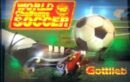 A soccer ball is in the air near a goal.