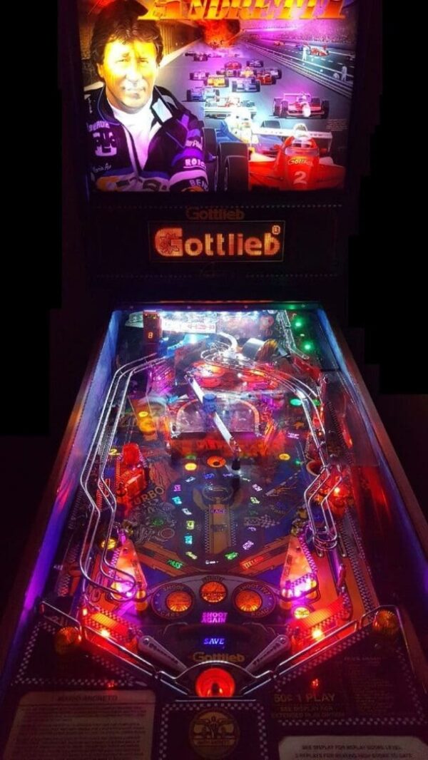 A pinball machine with lights and a gottlieb logo.