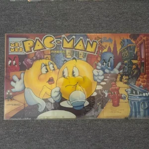 A pac-man poster with two cartoon characters.