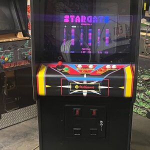 A video game machine that is sitting in the floor.