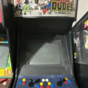 A video game machine with buttons and controls.