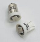 A pair of white led lights on top of a table.