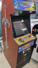 A video game machine with a sword on it.
