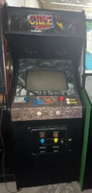 A video game machine with buttons and arrows.