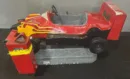 A red and yellow car is on the ground