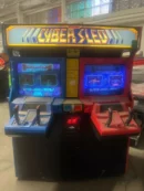 A video game machine that is lit up.