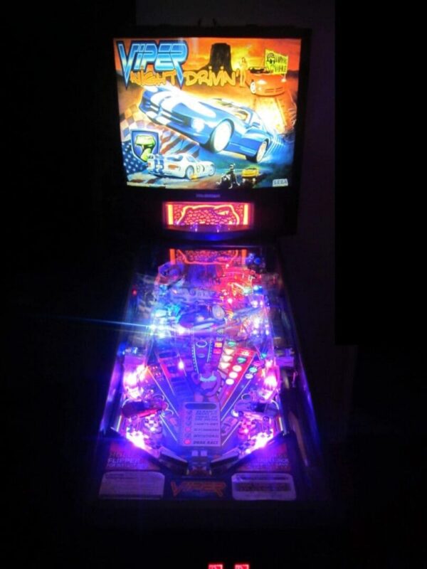 Illuminated Viper pinball machine with neon lights