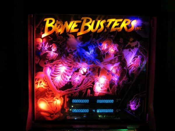 A neon sign that reads bone busters.