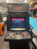 Die Hard arcade game cabinet with joysticks