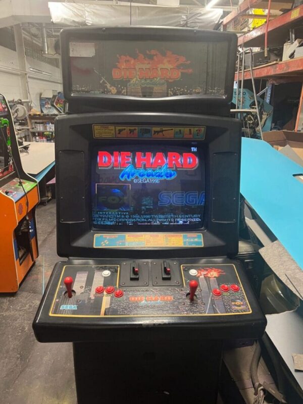 Die Hard arcade game cabinet with joysticks
