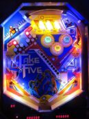 A close up of the fake five pinball machine.