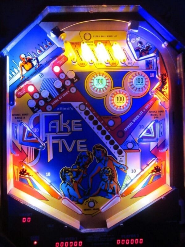 A close up of the fake five pinball machine.