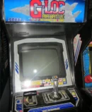A small arcade machine with a game on the screen.