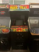 A row of arcade machines with different games on them.