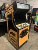 A video game arcade machine with many different games.