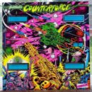 A counter force pinball machine with many different colors.