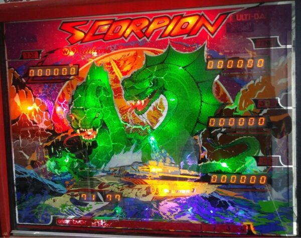 A close up of the neon lights on a pinball machine.